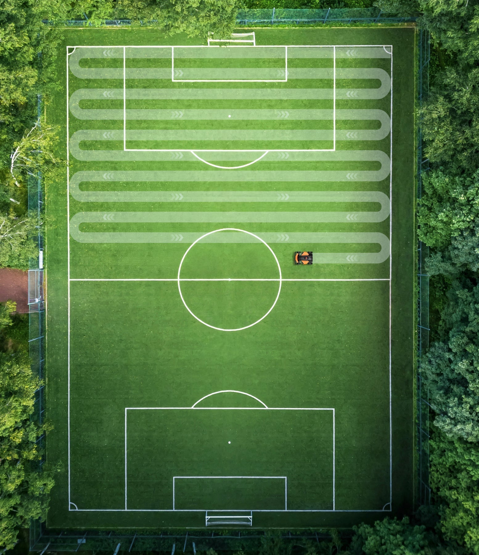 Navimow i110E robot lawn mower mows a large soccer field.