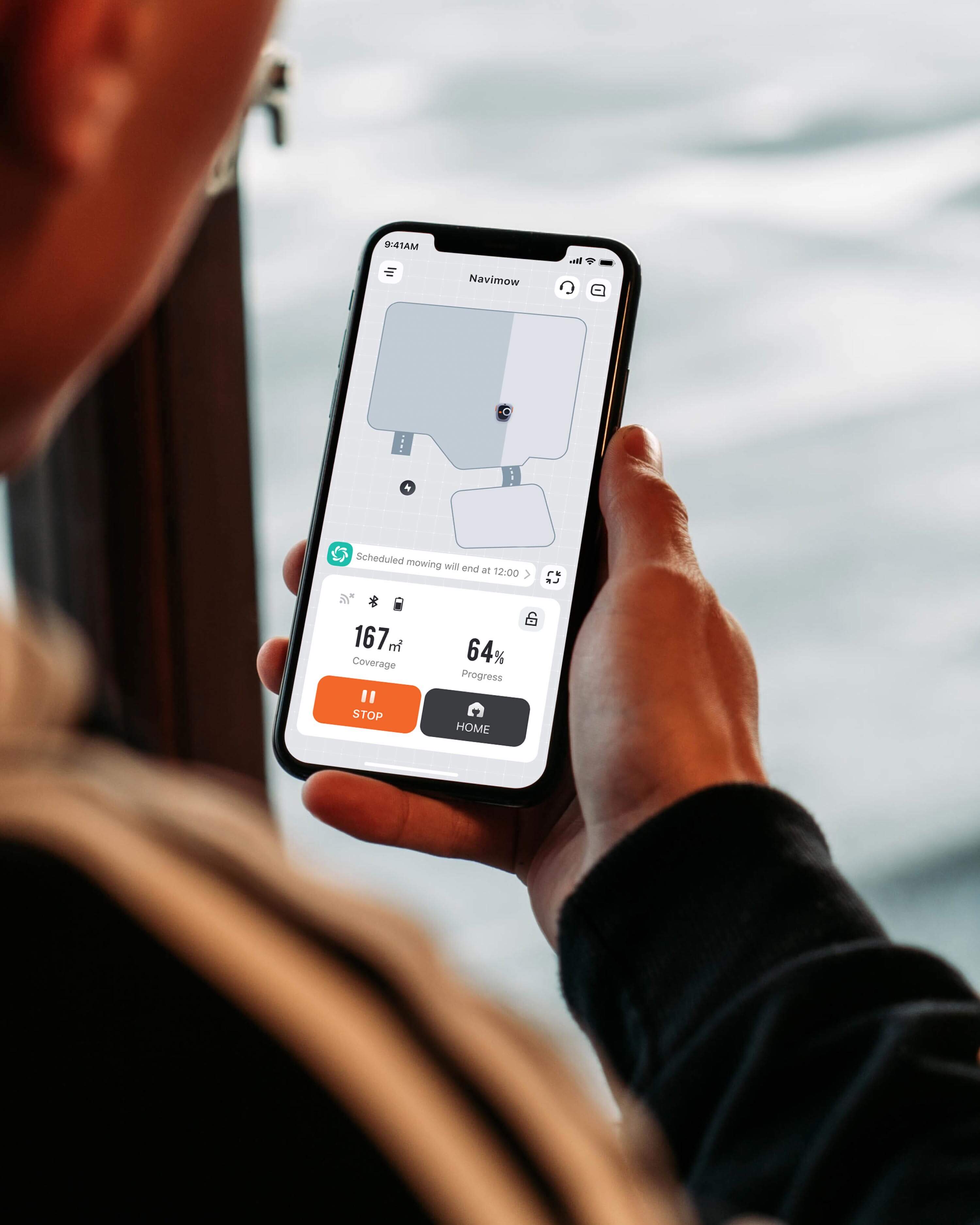 Navimow i110N robot lawn mower app shown on a smartphone.