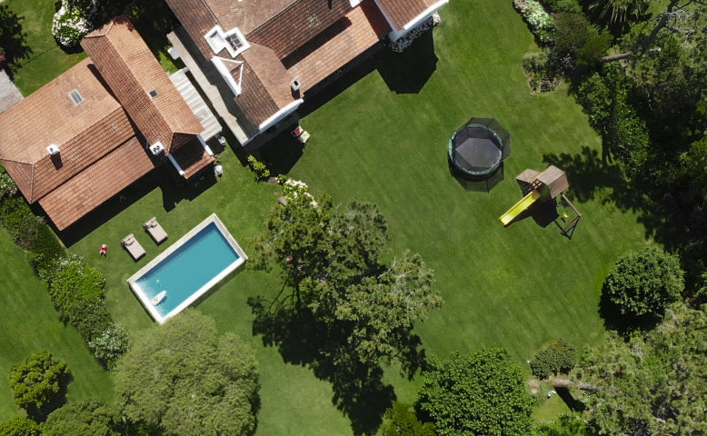 Segway Navimow i110E robot lawn mower mows the large lawn.