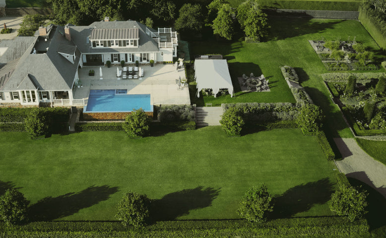 Segway Navimow H3000E robot lawn mower mows the green grass.