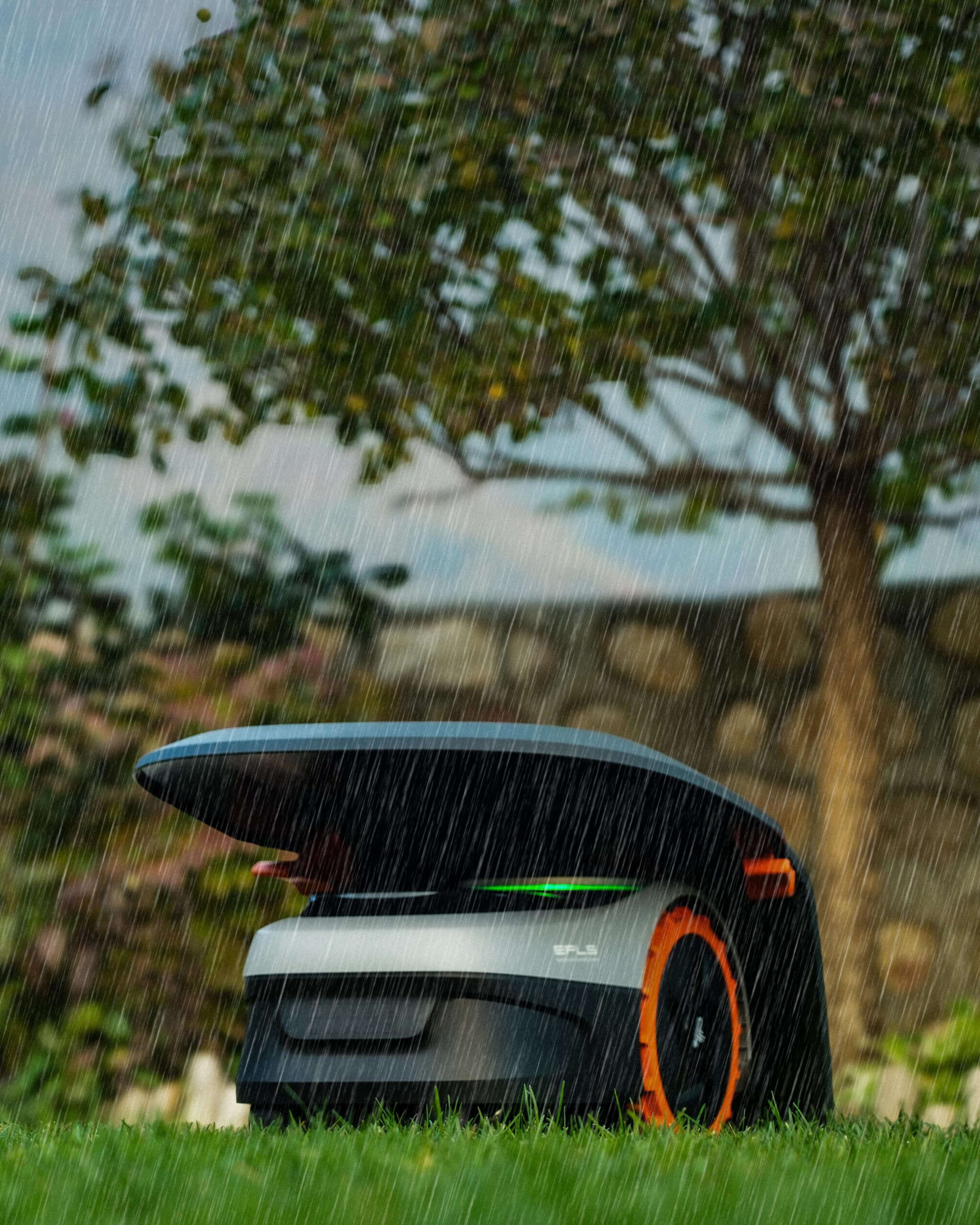 Segway Navimow i110N robot lawn mower mows in the rain.