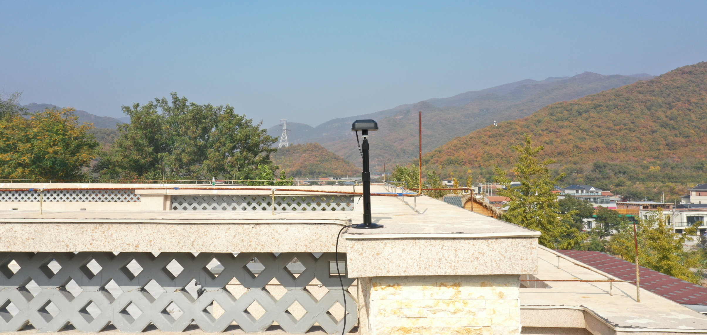 Segway Navimow i110E robot lawn mower antenna on a rooftop.