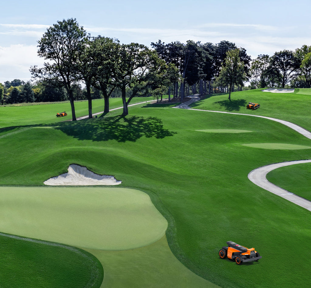 Segway Navimow i110N robot lawn mower on a golf course.