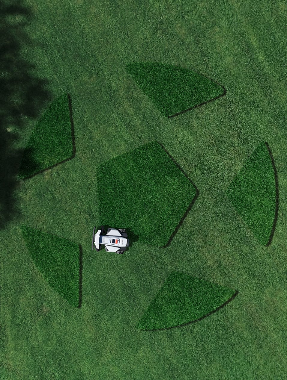 The Navimow i110 robot lawn mower mows a soccer ball.