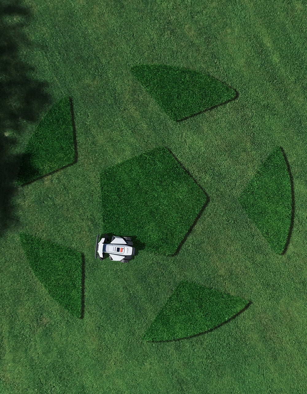 Navimow i110N robot lawn mower is cutting a soccer ball.