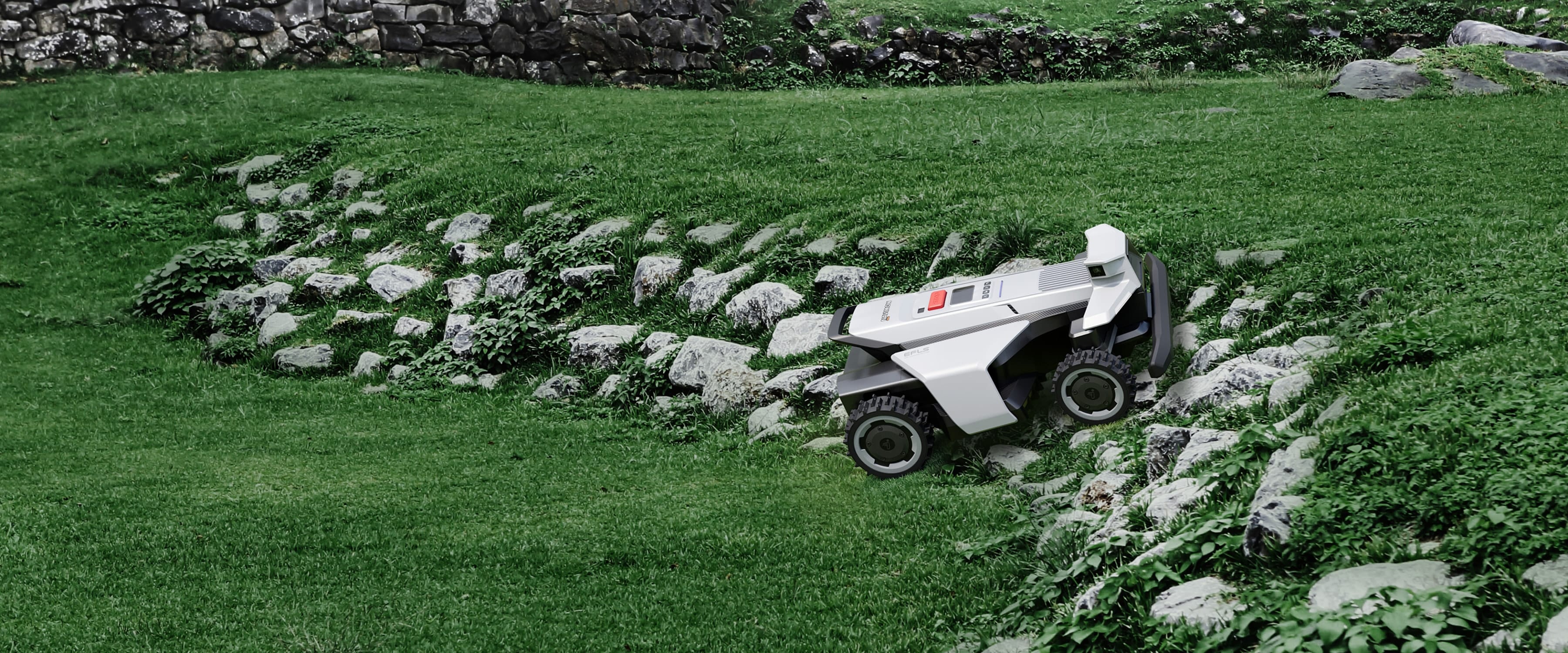 Segway Navimow i110N robot lawn mower on a rocky slope.