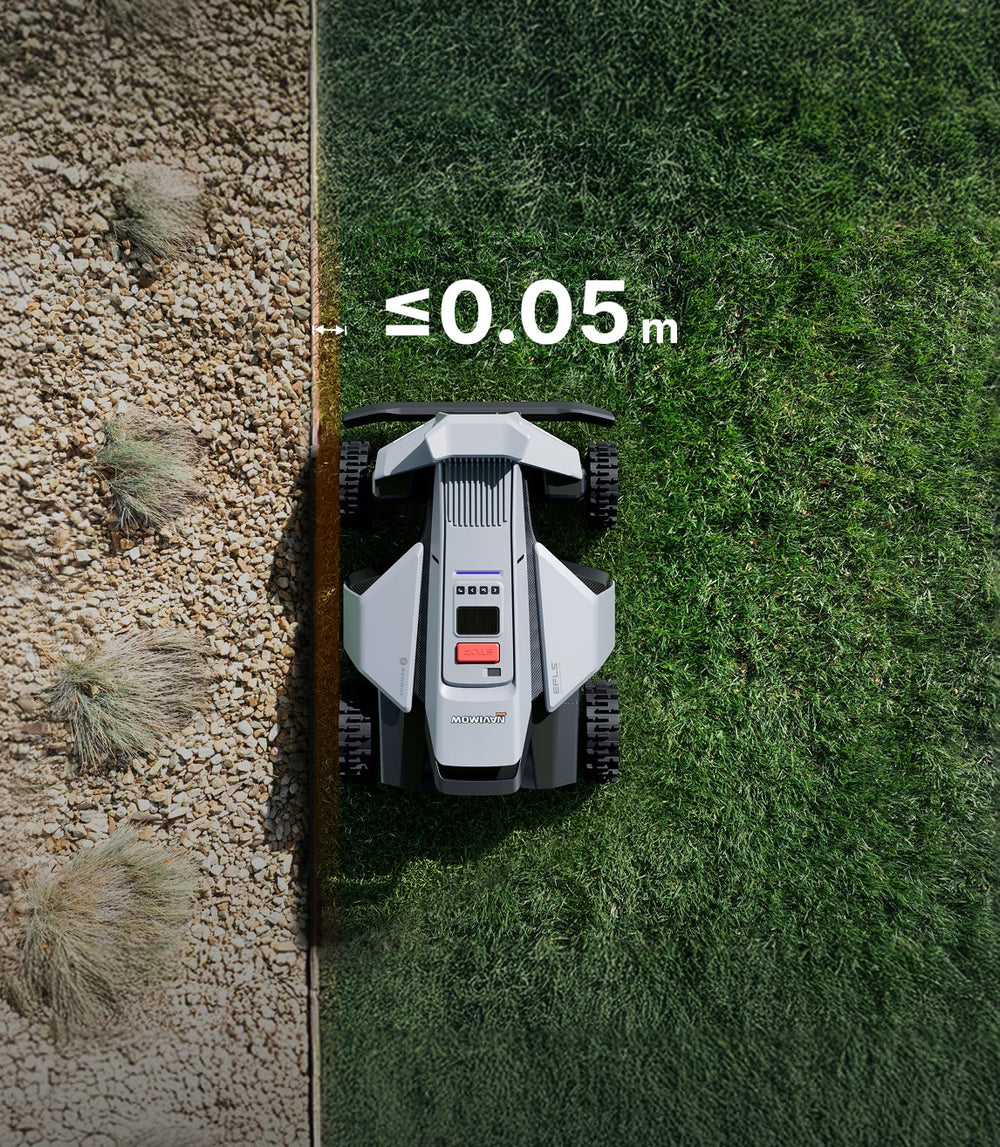 Segway Navimow robot lawn mower mows the green grass edge.