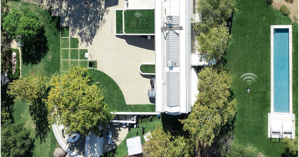 Segway Navimow i110N robot lawn mower mows the green grass.