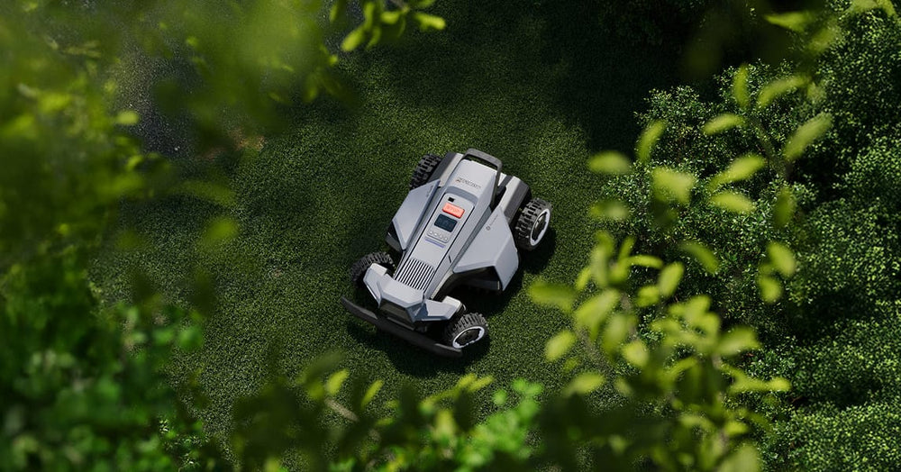 Navimow i110 robot lawn mower on the lush green grass.