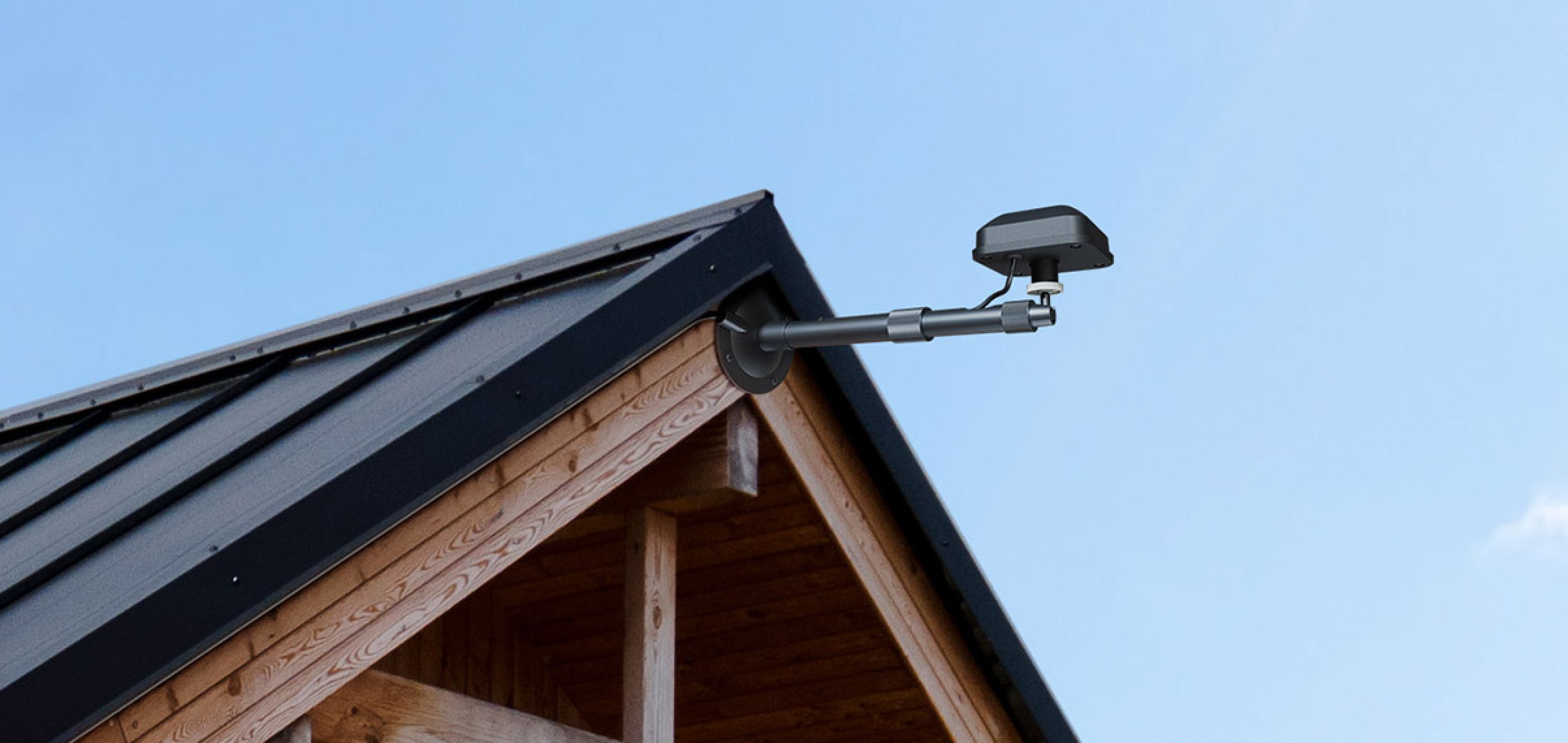 Navimow i110E robot lawn mower antenna kit on a roof.