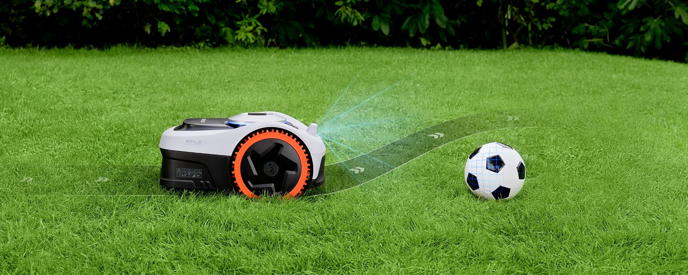 Navimow i110N robot lawn mower avoids hitting a soccer ball.