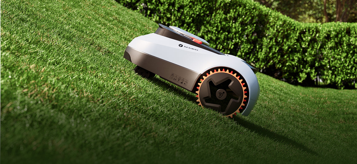 Segway Navimow i110N robot lawn mower on a steep slope.