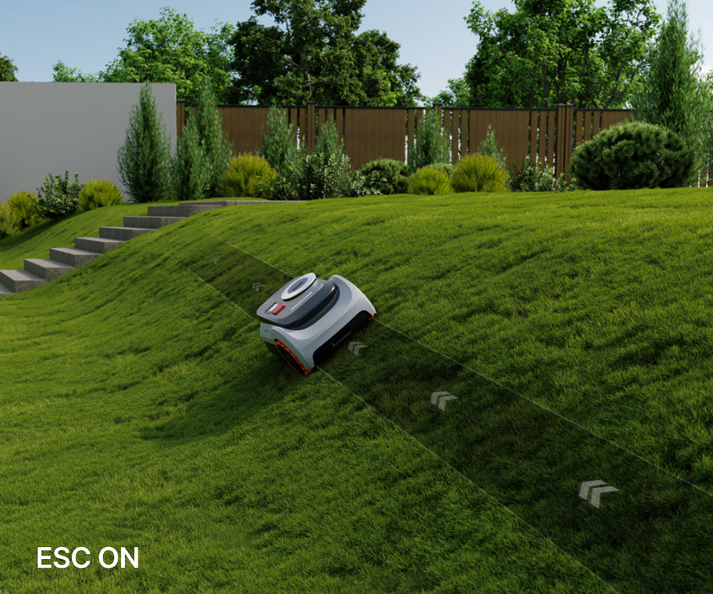 Navimow i110E robot lawn mower mows a steep green slope.