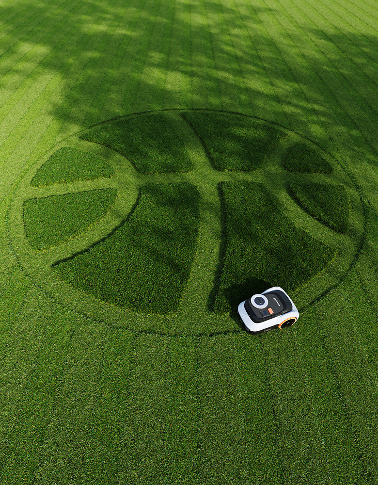 Navimow i110N robot lawn mower mows giant basketball on grass.