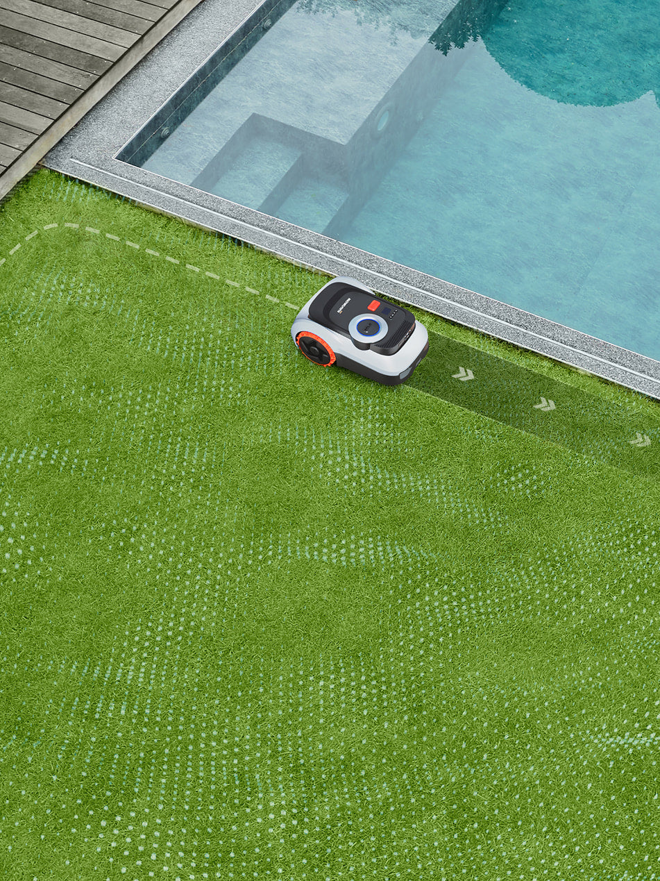 Segway Navimow i105E robot lawn mower mows grass near pool.