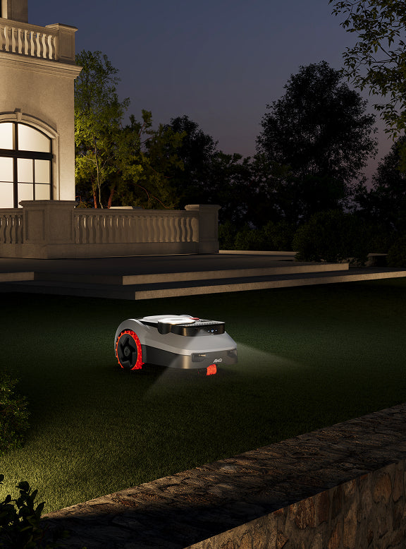 Navimow i110N robot lawn mower mows the backyard grass tonight.