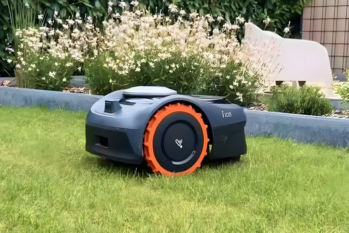 Navimow i108 robot lawn mower mows the grass in garden.