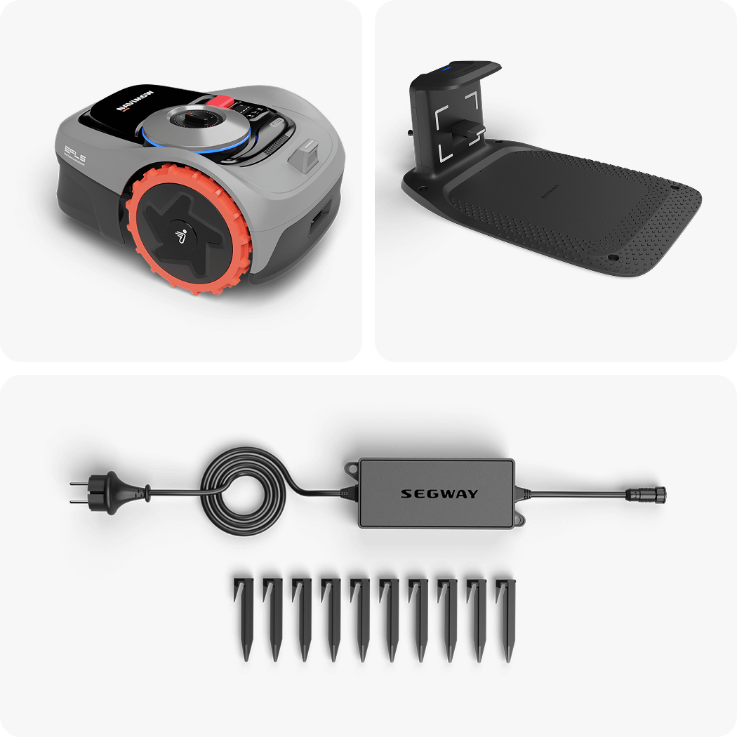 Segway Navimow i105E robot lawn mower with charging station accessories.